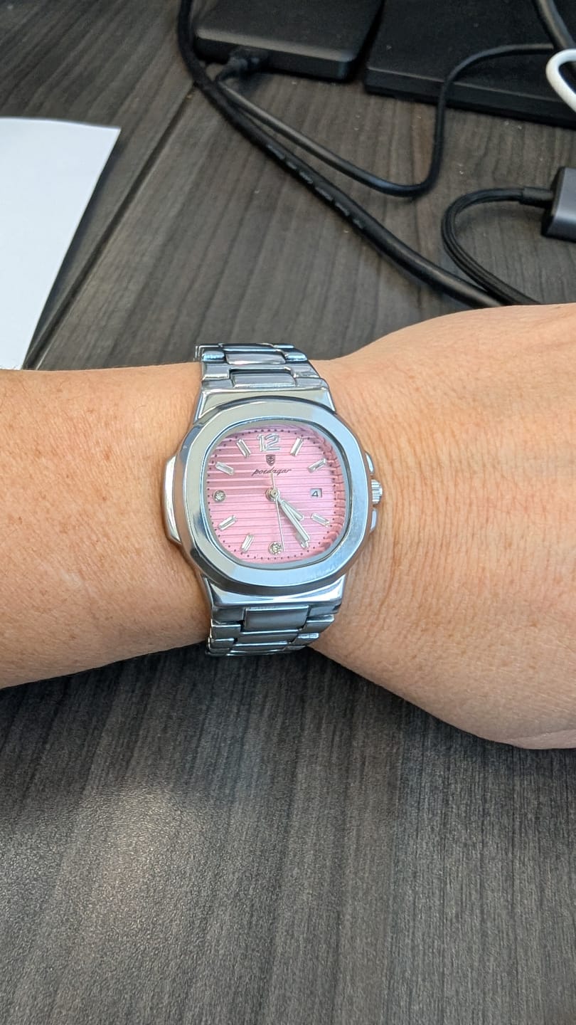 Lumora customer wearing a watch