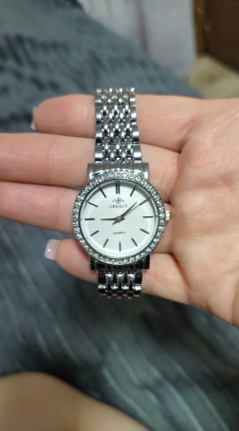 Lumora customer wearing a watch