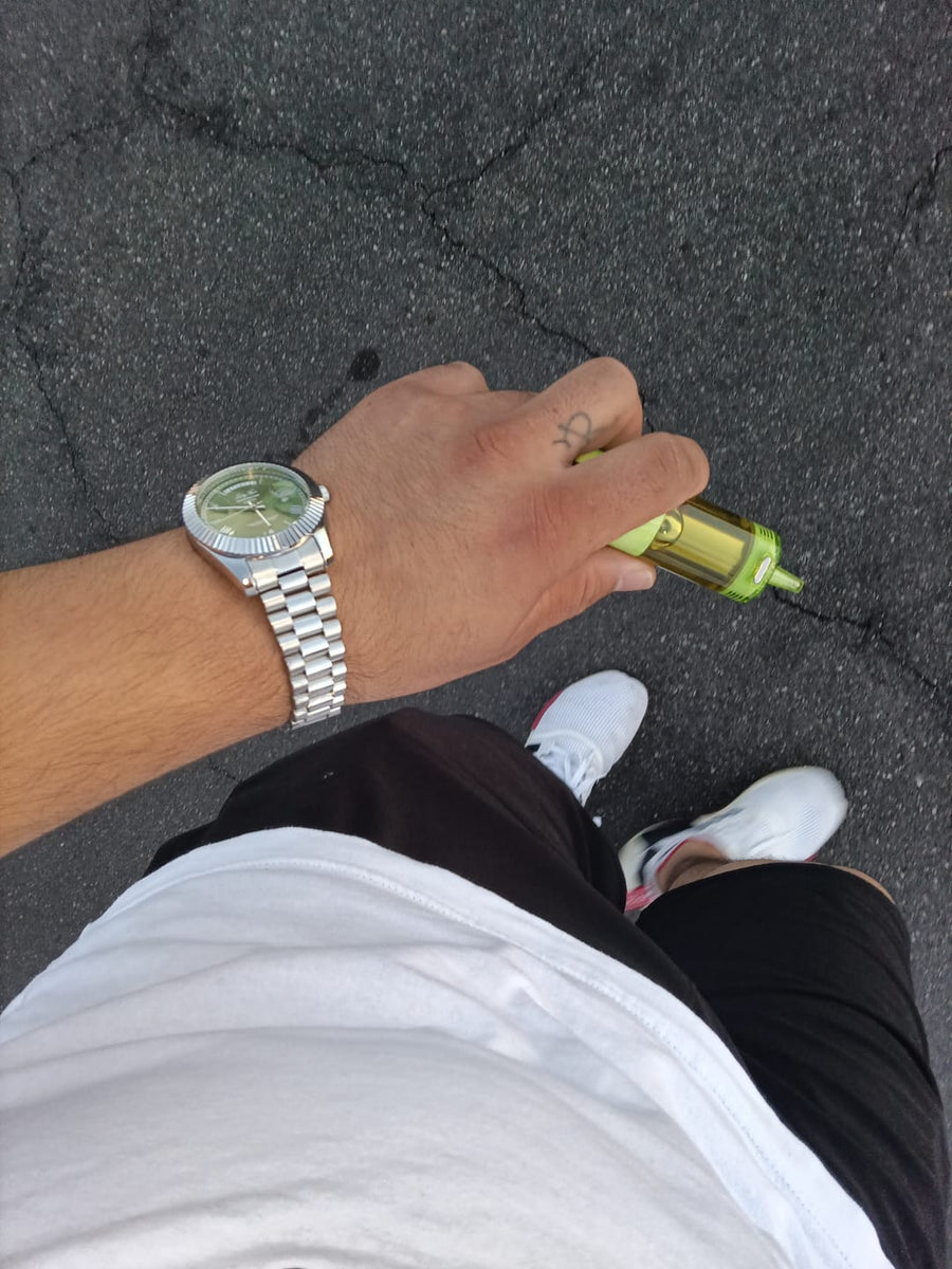 Customer wearing a green dial Lumora watch