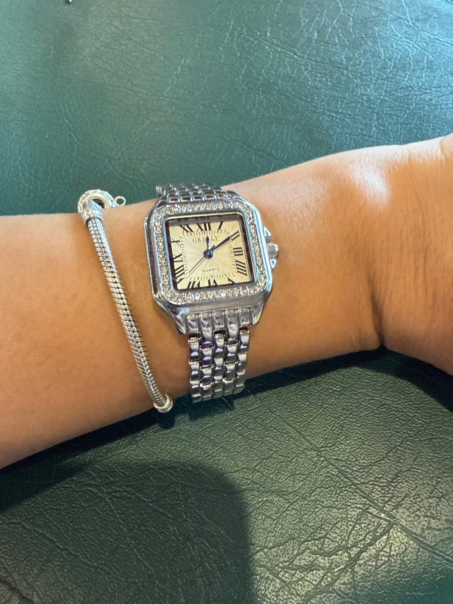 Lumora customer wearing a watch